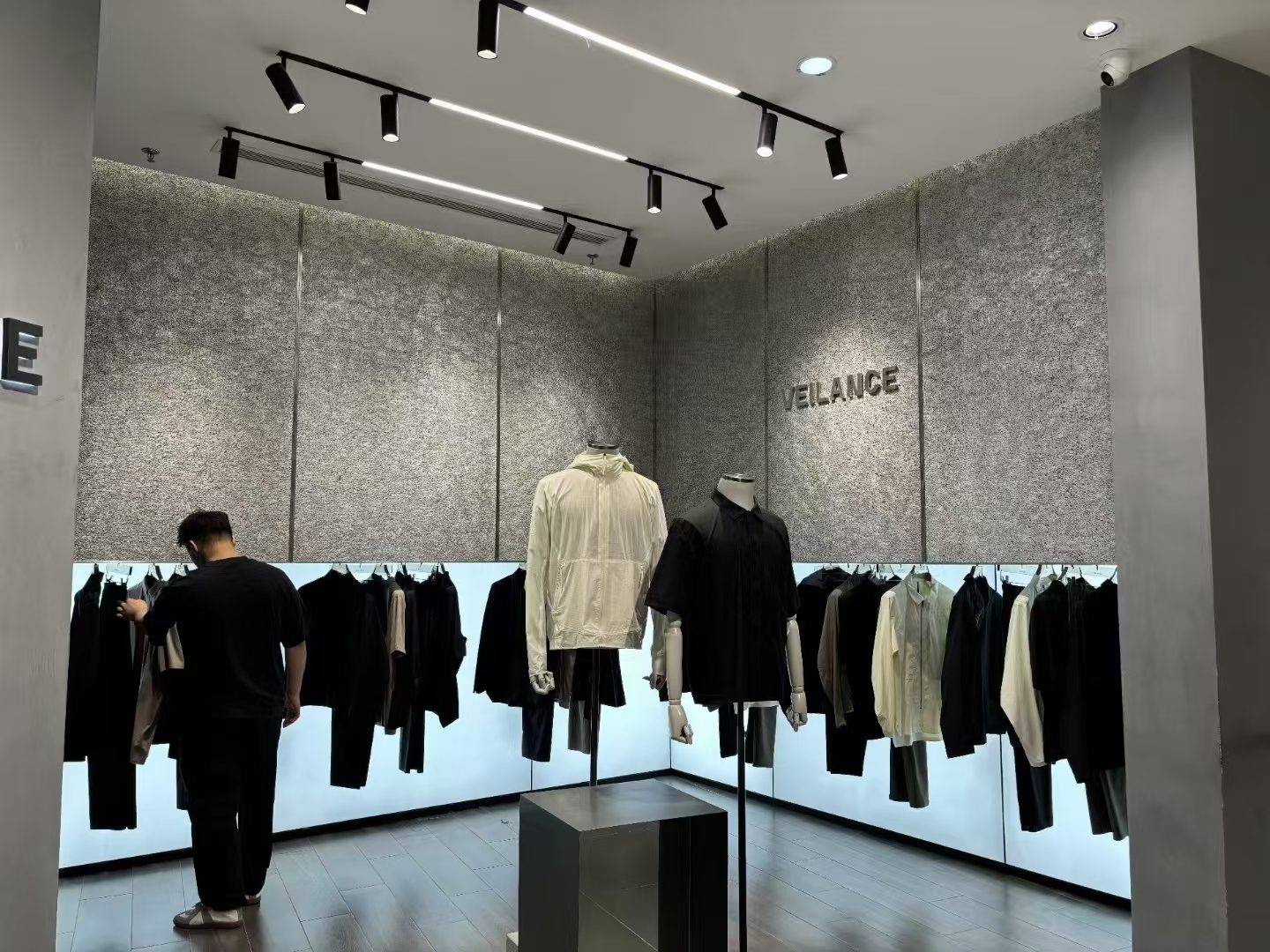 Closed-cell aluminum foam wall decoration for a clothing store