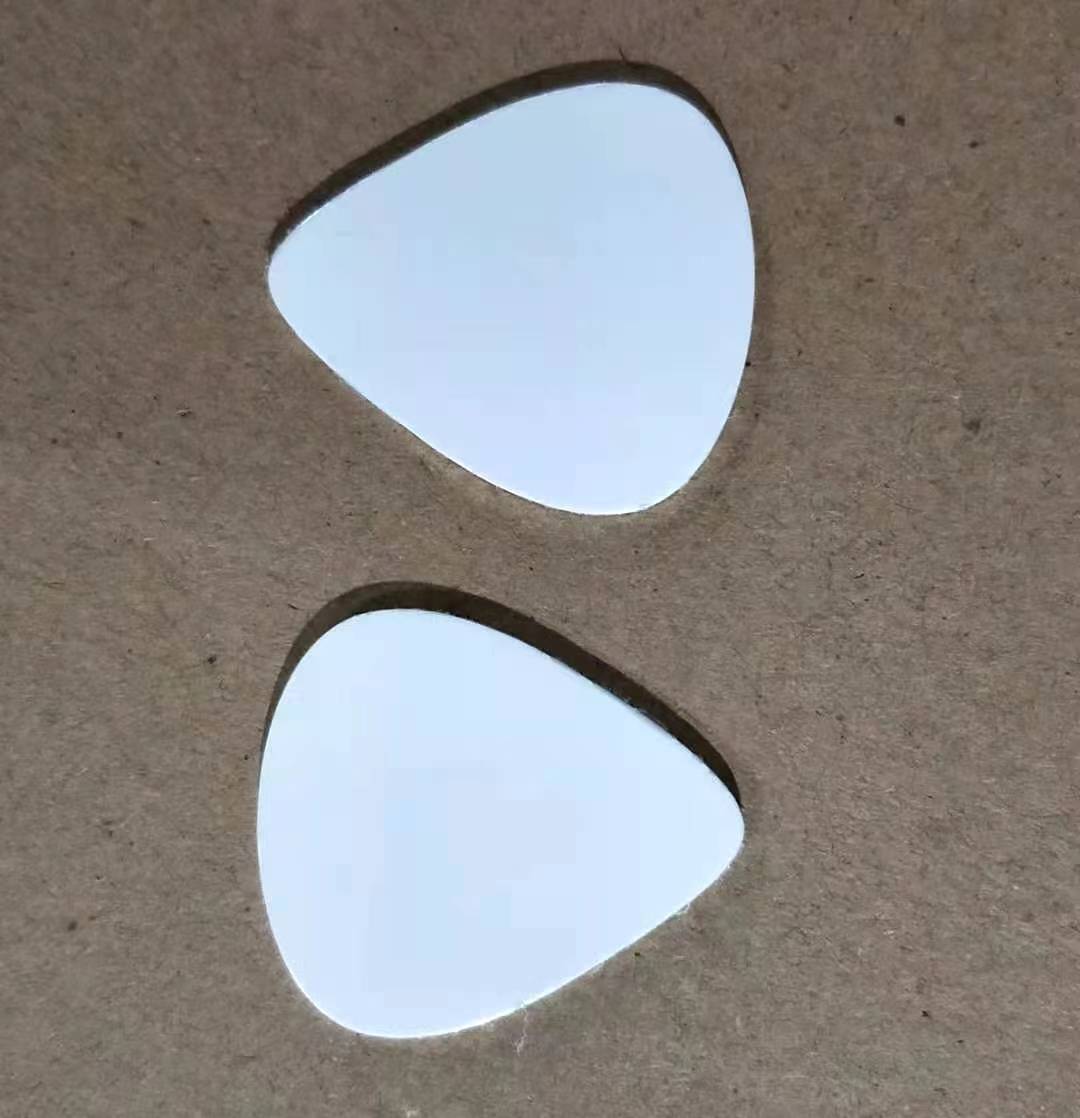 Médiator de guitare sublimé